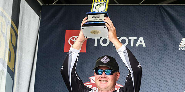 Josh Stracner Holding A Trophy